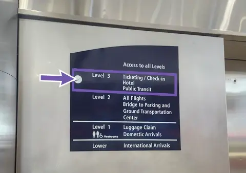 MichiganFlyer_ElevatorSign-WithArrows